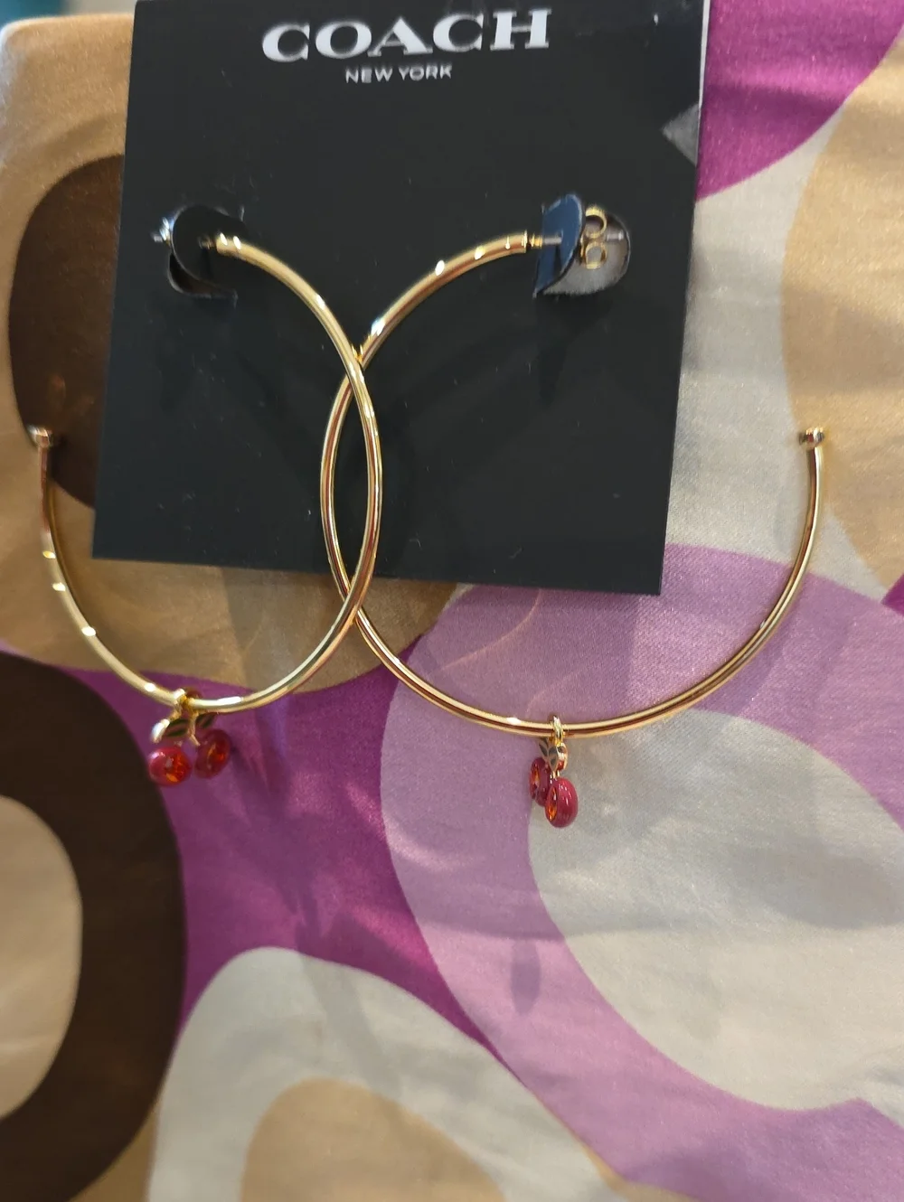 COACH Gold Hoop Earrings with Red Enamel Cherries